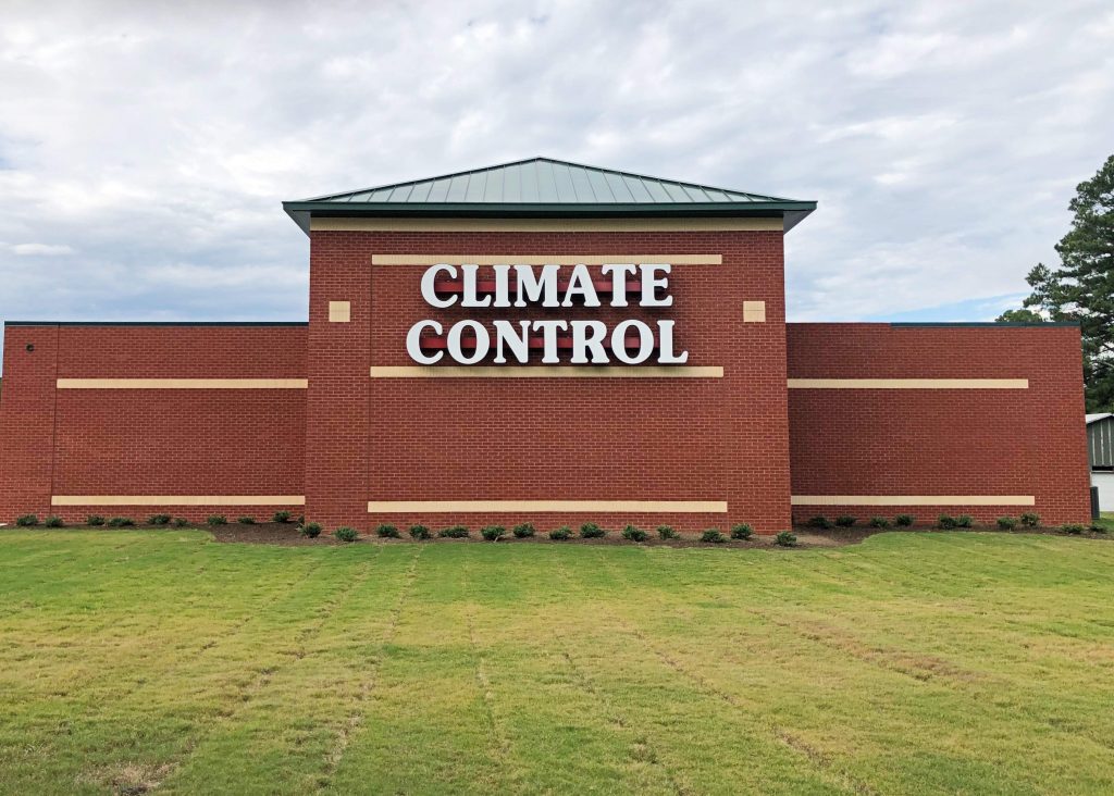 View of exterior of Ample Storage Rocky Mount facility, climate controlled signage.